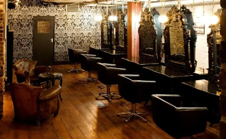 Waiting area with brick walls and leather seating