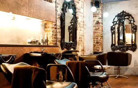 Styling chairs and ornate mirrors